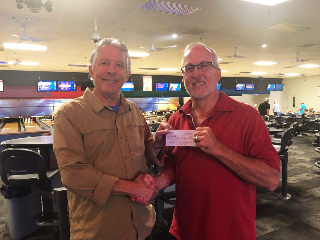 Lava Lanes receiving check