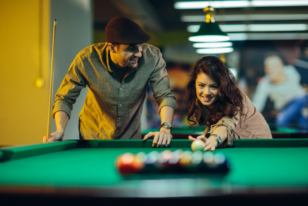 people playing pool